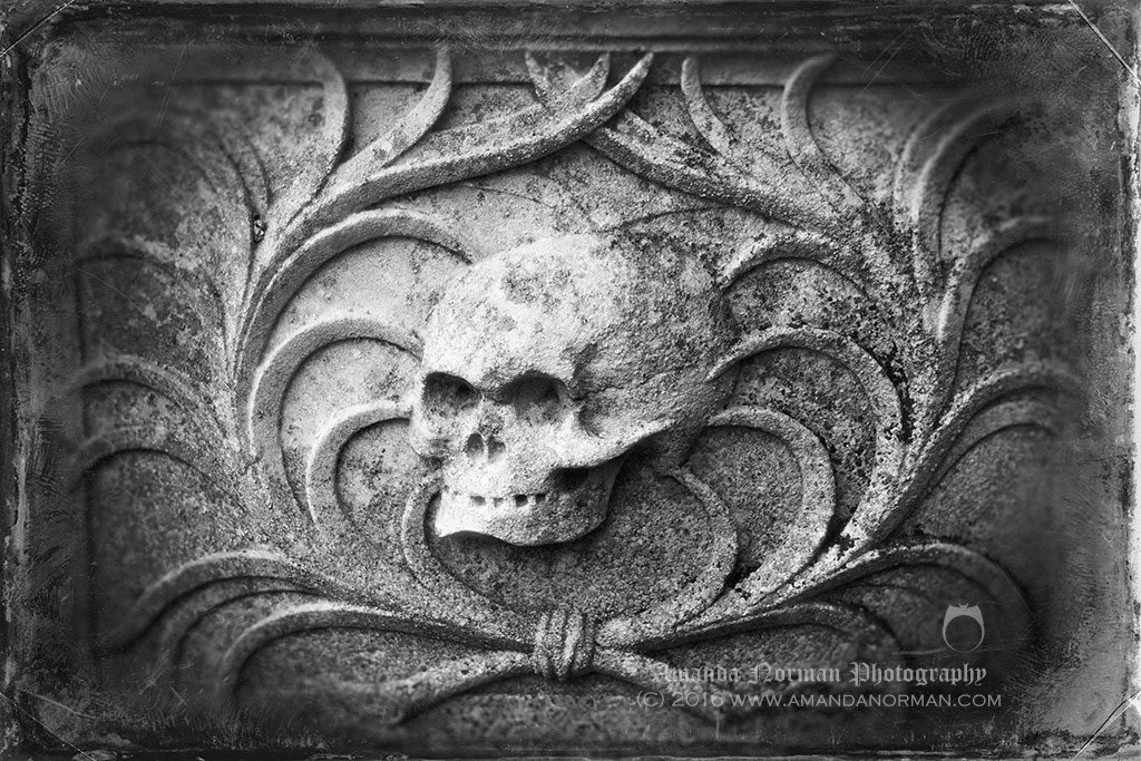Carved skull on a tomb in Burwell