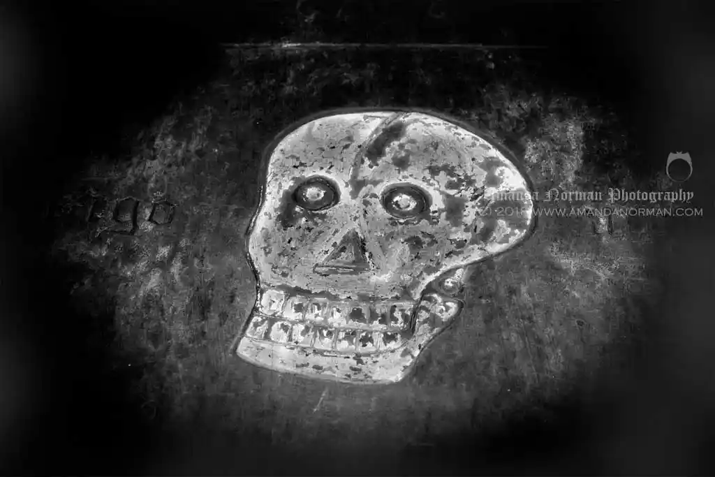 Photograph of an etched skull from Cornwall